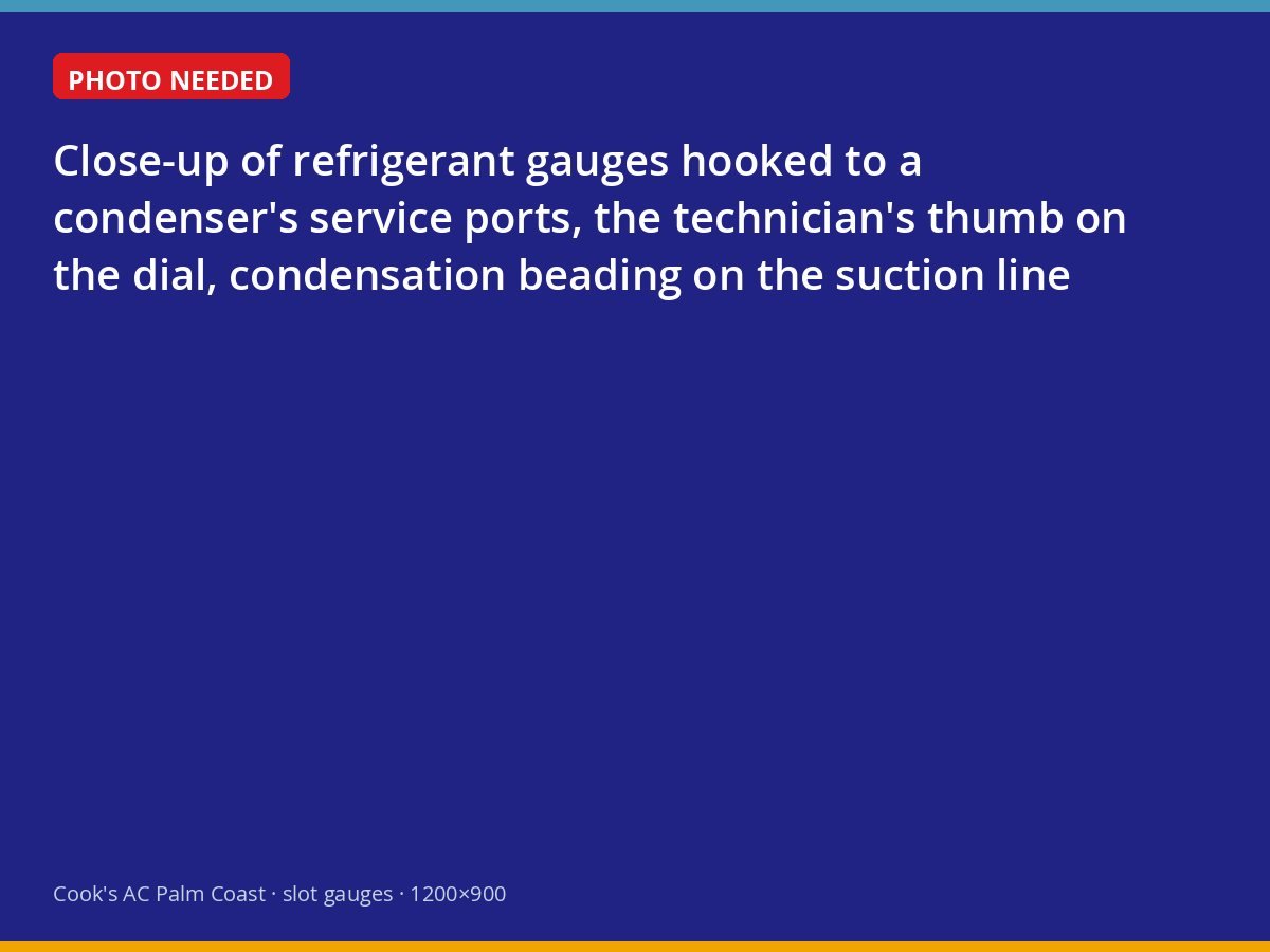 Refrigerant gauges connected to an outdoor air-conditioning unit during a diagnostic check