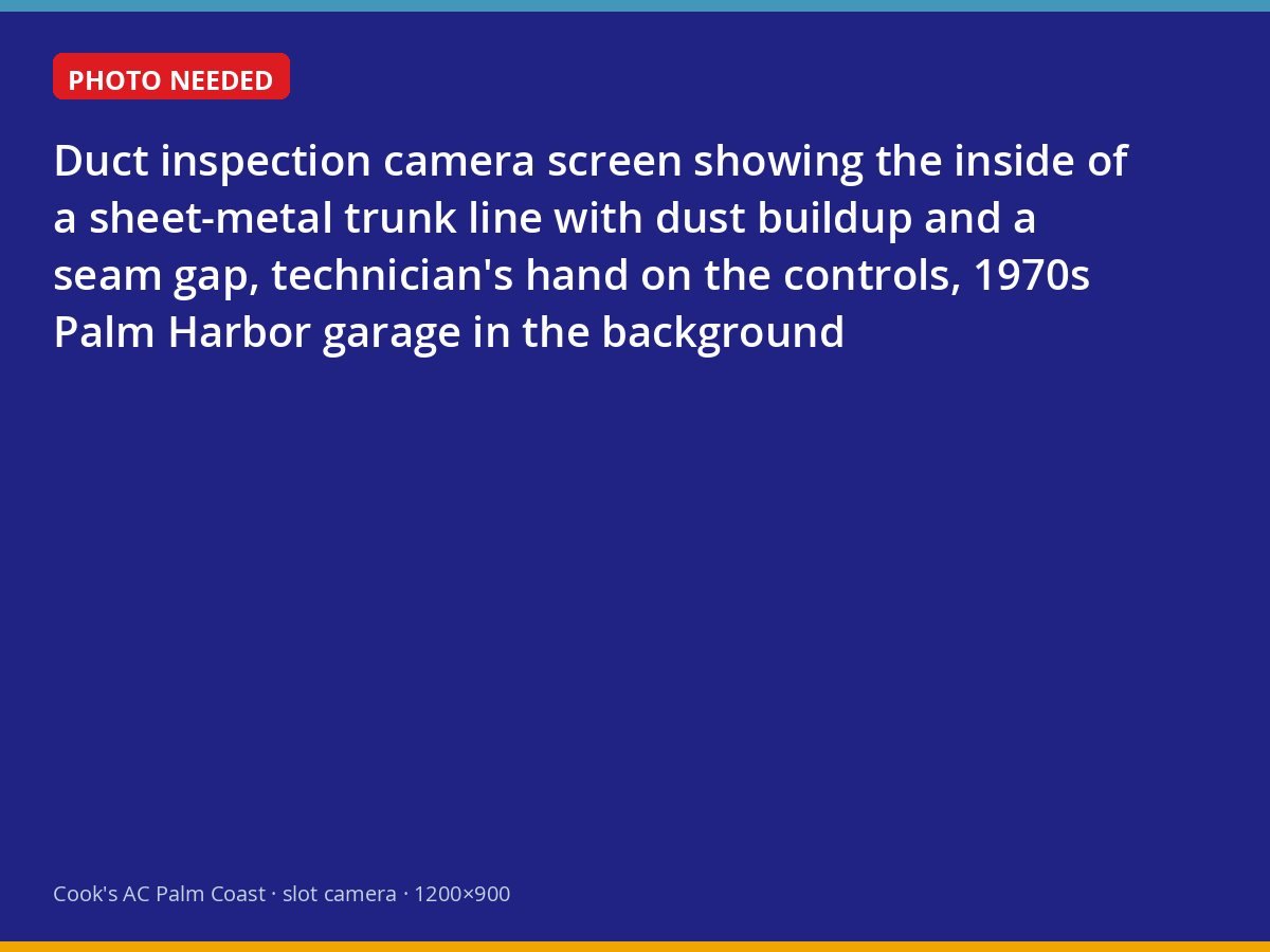 Inspection camera view inside an older sheet-metal duct in a Palm Harbor home